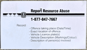 Back of Jasper van Balen Walter's business card with information to report resource abuse.